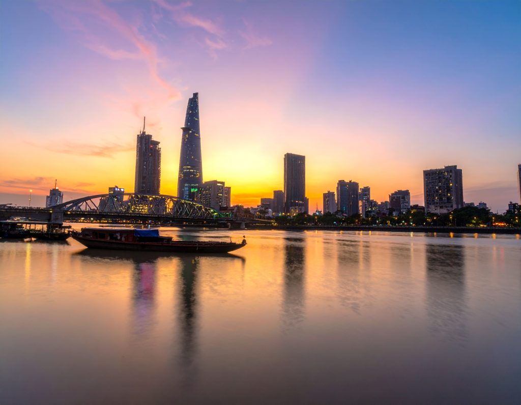 Ho Chi Minh City skyline with Bitexco Financial Tower at sunset – perfect view for a long layover in 2025