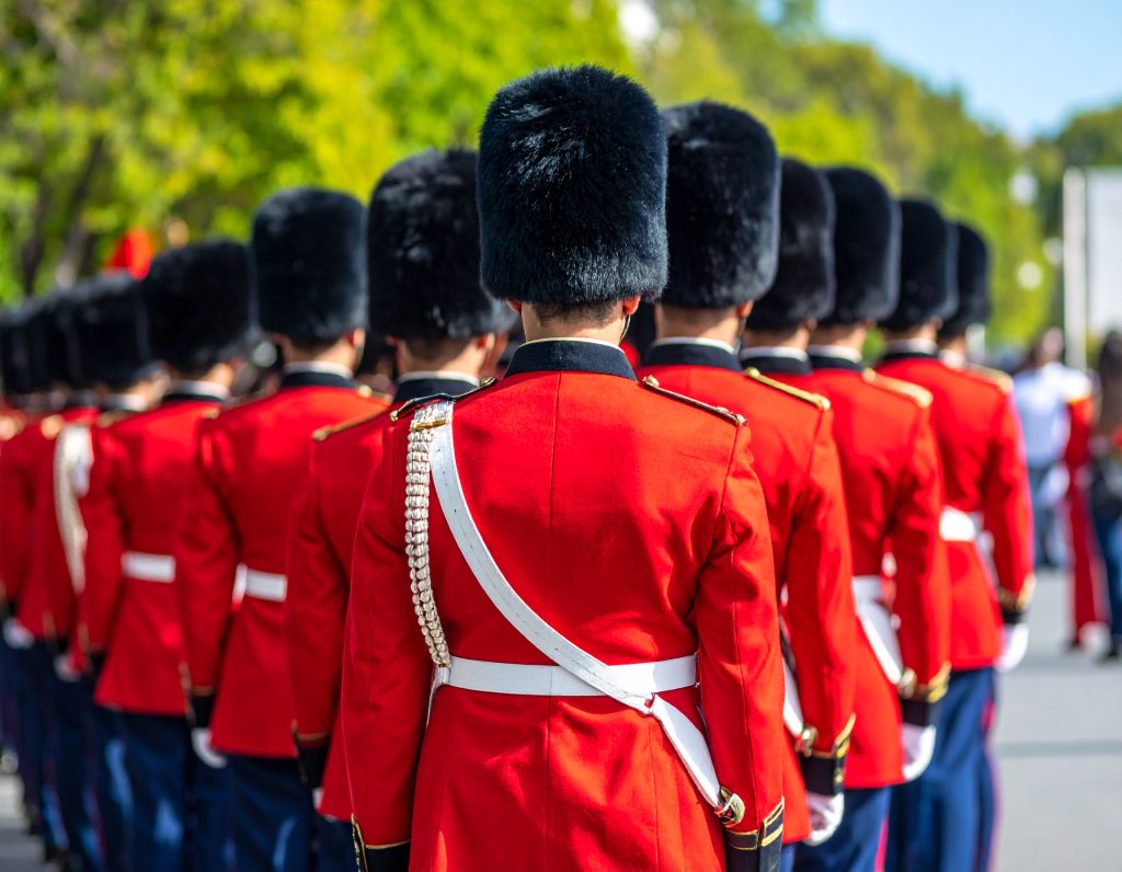 Parade at Buckingham Palace with visitors view.