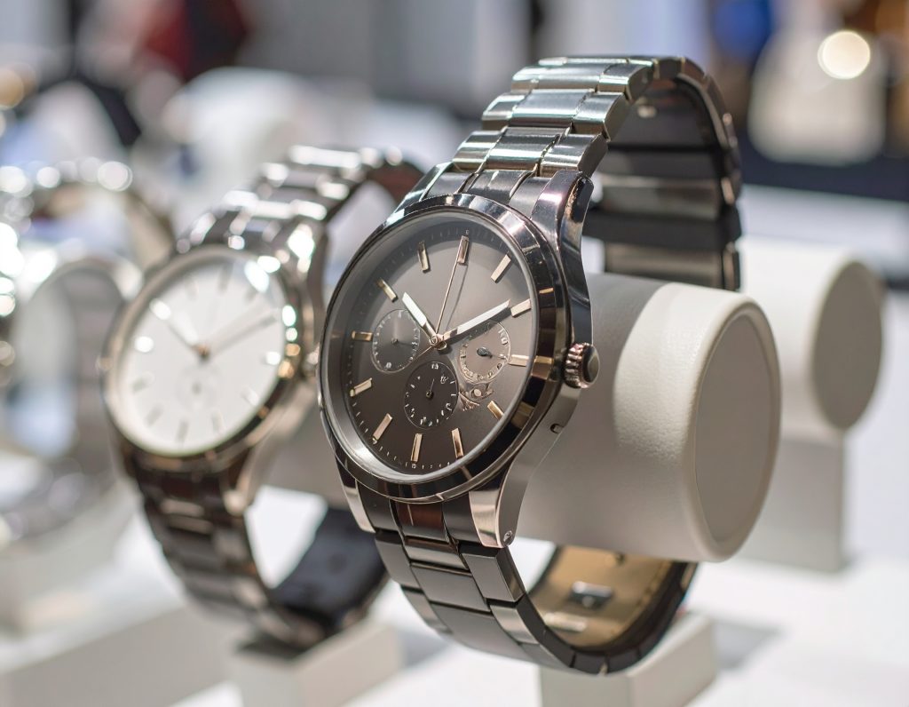 Cartier luxury watches in airport duty-free shop.