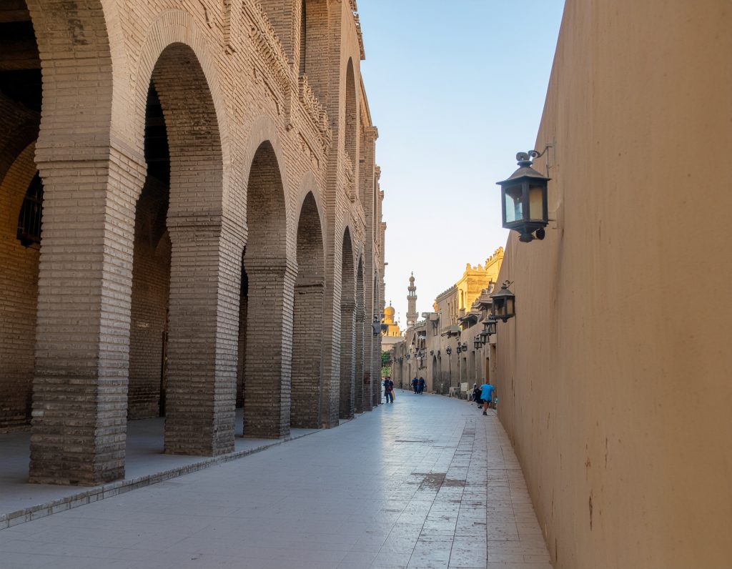 Historic Islamic architecture along Al-Muizz Street in Cairo.